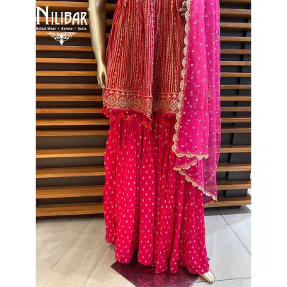 Magenta Georgette Peplum Suit.