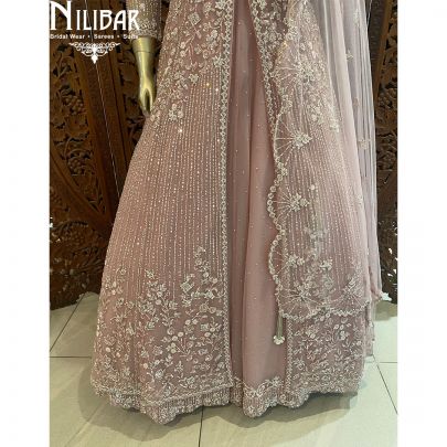 Baby Pink Net Cape style Heavy Lehenga