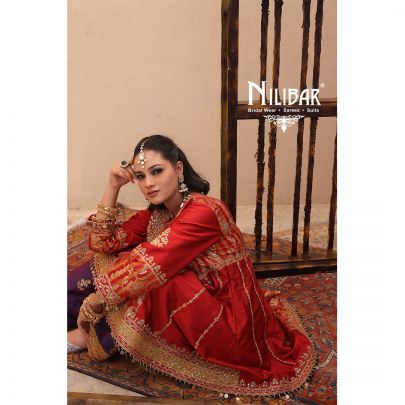 Orange Silk Shirt Paired With Purple Contrast Salwar & Net Dupatta
