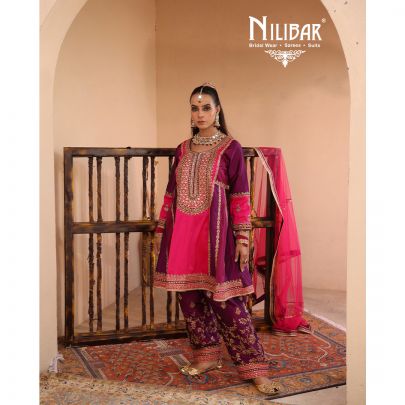 Purple & Pink Silk Shirt Paired With Purple Salwar & Pink Net Dupatta