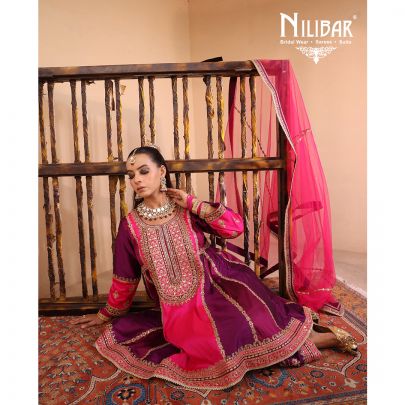 Purple & Pink Silk Shirt Paired With Purple Salwar & Pink Net Dupatta