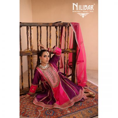 Purple & Pink Silk Shirt Paired With Purple Salwar & Pink Net Dupatta