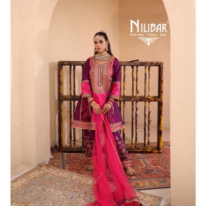 Purple & Pink Silk Shirt Paired With Purple Salwar & Pink Net Dupatta