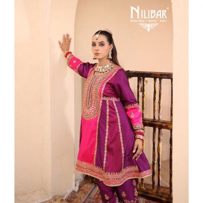 Purple & Pink Silk Shirt Paired With Purple Salwar & Pink Net Dupatta