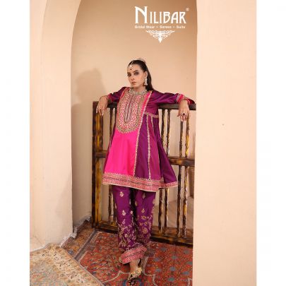 Purple & Pink Silk Shirt Paired With Purple Salwar & Pink Net Dupatta