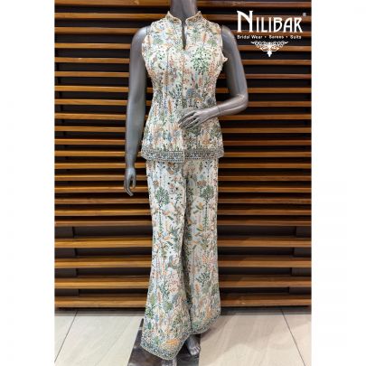 White Georgette Mid Length Top Paired Straight Pants