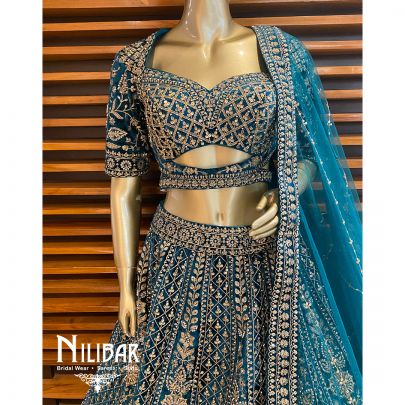 Rama Green Velvet Cutdana Lehenga