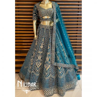 Rama Green Velvet Cutdana Lehenga