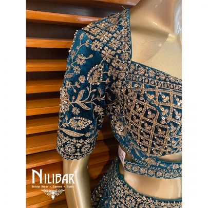 Rama Green Velvet Cutdana Lehenga