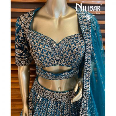 Rama Green Velvet Cutdana Lehenga