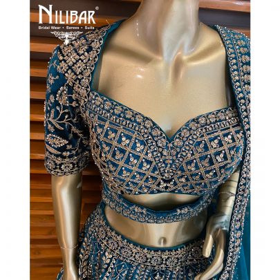 Rama Green Velvet Cutdana Lehenga