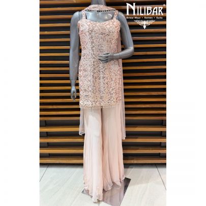Peach Georgette Mid Length Shirt Paired With Jaffa Pants & Net Dupatta