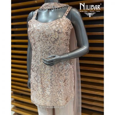 Peach Georgette Mid Length Shirt Paired With Jaffa Pants & Net Dupatta