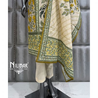 Ivory and Green Muslin Long Kurta Paired With Pants and Dupatta