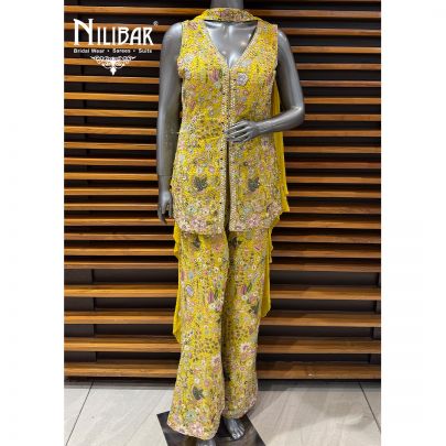 Yellow Georgette Top Paired With Bell Bottom Pants