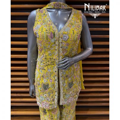Yellow Georgette Top Paired With Bell Bottom Pants