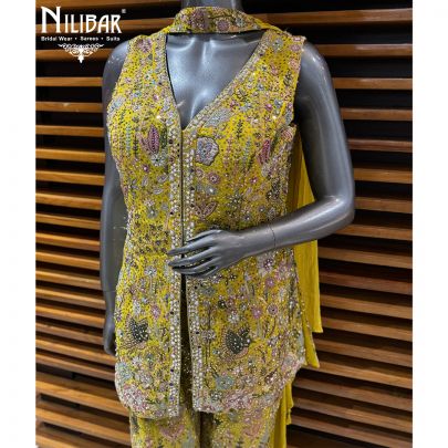 Yellow Georgette Top Paired With Bell Bottom Pants