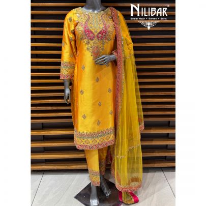 Yellow Silk A-Line Shirt Paired With Pants & Net Dupatta