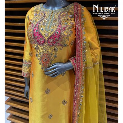 Yellow Silk A-Line Shirt Paired With Pants & Net Dupatta