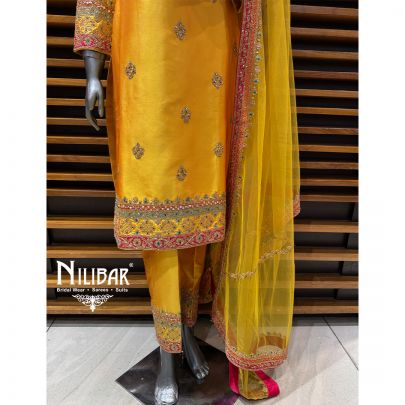 Yellow Silk A-Line Shirt Paired With Pants & Net Dupatta