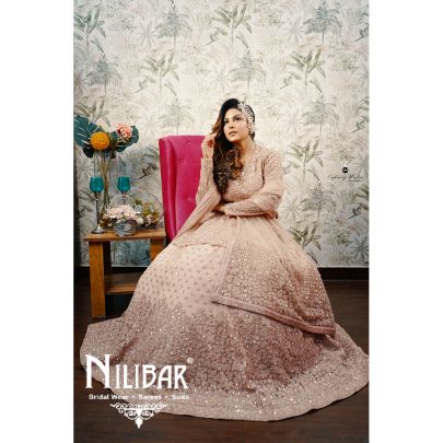 Salmon Pink Net Peplum Lehenga