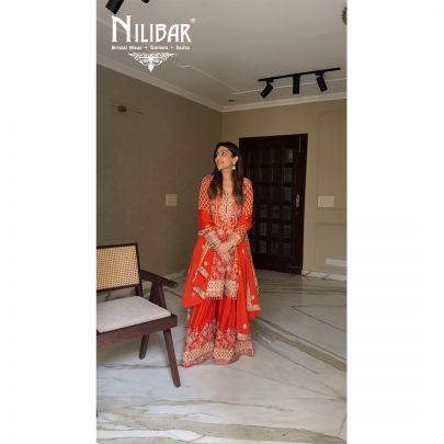 Yukta In Our Orange Chinon Short Anarkali Suit