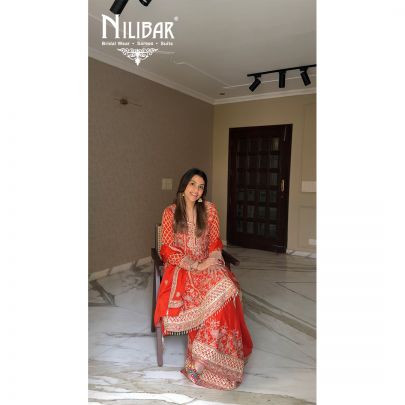 Yukta In Our Orange Chinon Short Anarkali Suit