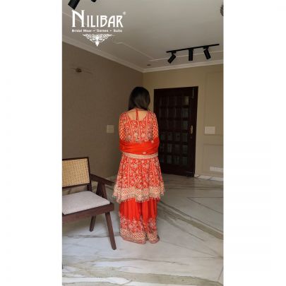 Yukta In Our Orange Chinon Short Anarkali Suit