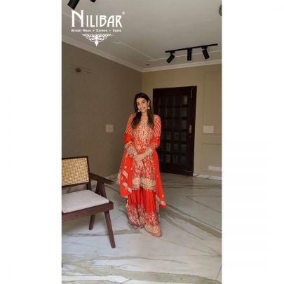 Yukta In Our Orange Chinon Short Anarkali Suit
