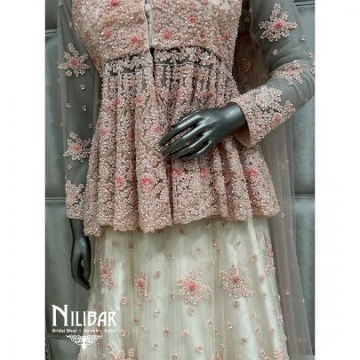Off White and Light Pink Net Lehenga With Peplum Top