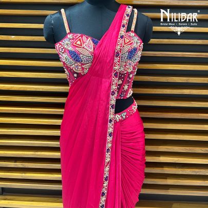 Rani Pink Net Blouse Paired With Chinon Drape Saree