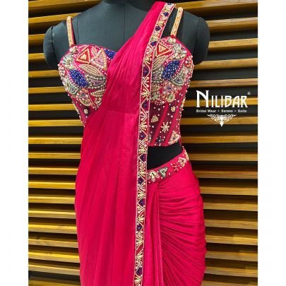 Rani Pink Net Blouse Paired With Chinon Drape Saree