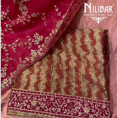Rani Pink Lame Silk Unstitched Suit