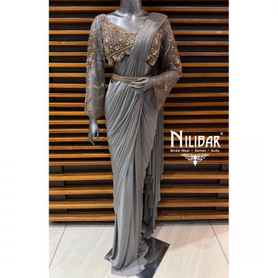 Grey Embroidered Full Sleeve Blouse Paired With Lycra Drape Saree