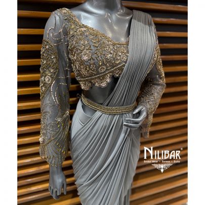 Grey Embroidered Full Sleeve Blouse Paired With Lycra Drape Saree