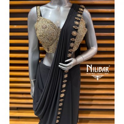 Black & Gold Heavy Embroidered Blouse Paired With Georgette Pleated Drape Saree