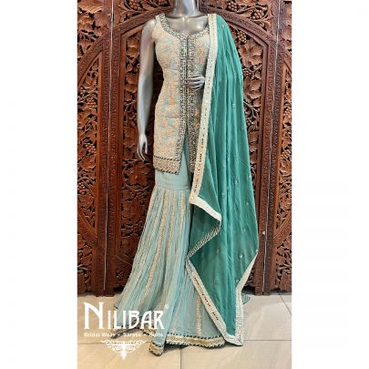 Pista Green With Contrast Jade Green Georgette Garara Suit