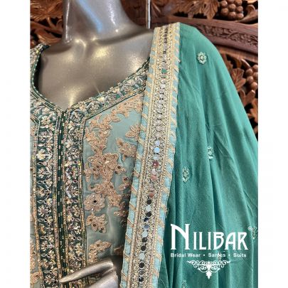 Pista Green With Contrast Jade Green Georgette Garara Suit