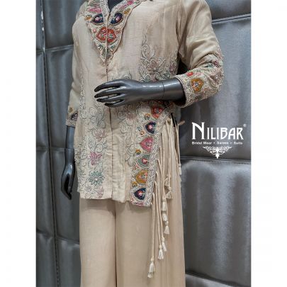 Pale Pink Net Blouse Paired With Georgette Drape Saree