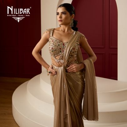 Gold Net Blouse Paired With Lycra Drape Saree