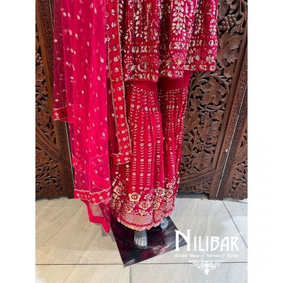 Pink Georgette Net Peplum Suit