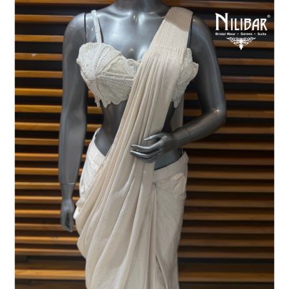 Ivory Gold Lycra Pre-Draped Saree Paired With Net Blouse