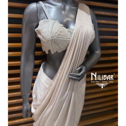 Ivory Gold Lycra Pre-Draped Saree Paired With Net Blouse