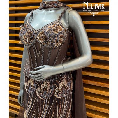 Coffee Net Lehenga Paired With Corset Top