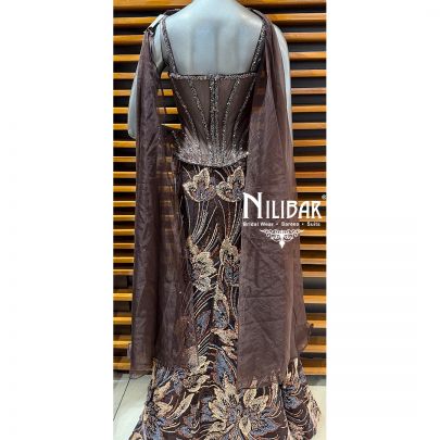 Coffee Net Lehenga Paired With Corset Top