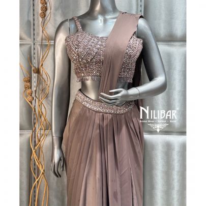 Gold Draped Stitched Lycra Saree