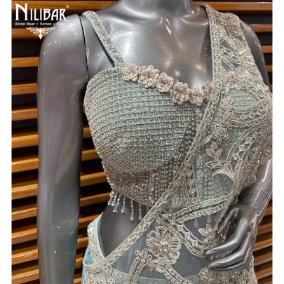 Light Blue Net Top Paired With Georgette Bottom Lehenga