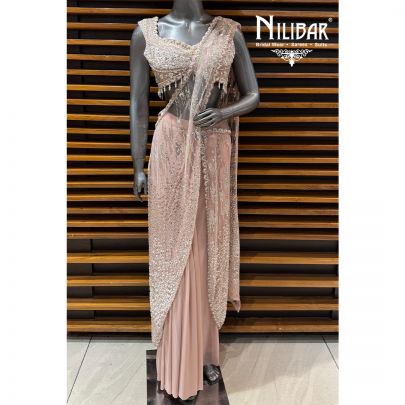 Baby Pink Net Heavy Embroidered Blouse Paired With Drape Saree