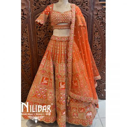 Rust Orange Silk Net Bridal Lehenga