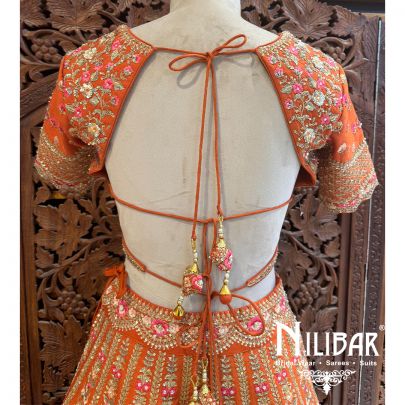 Rust Orange Silk Net Bridal Lehenga